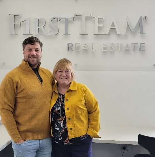 Barbara and David at FirstTeam Real Estate office